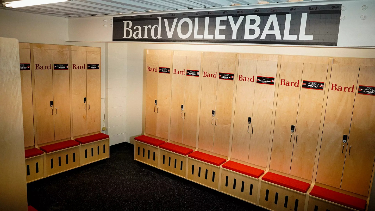 Custom athletic lockers with cushioned seating and enclosed storage